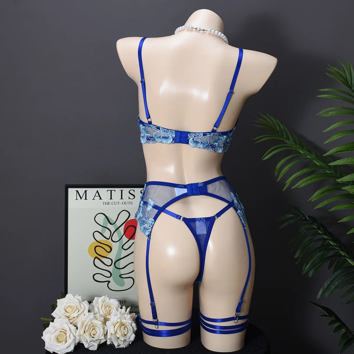 Back view of Premium Floral Lace 5-Piece Lingerie Set in blue, showcasing elegant design and adjustable fit.