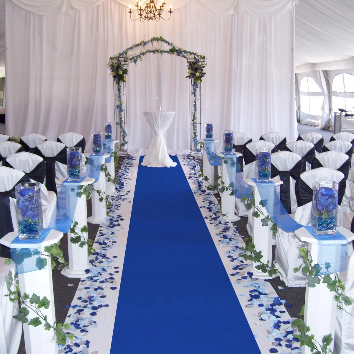 a wedding ceremony setup with blue and white decorations