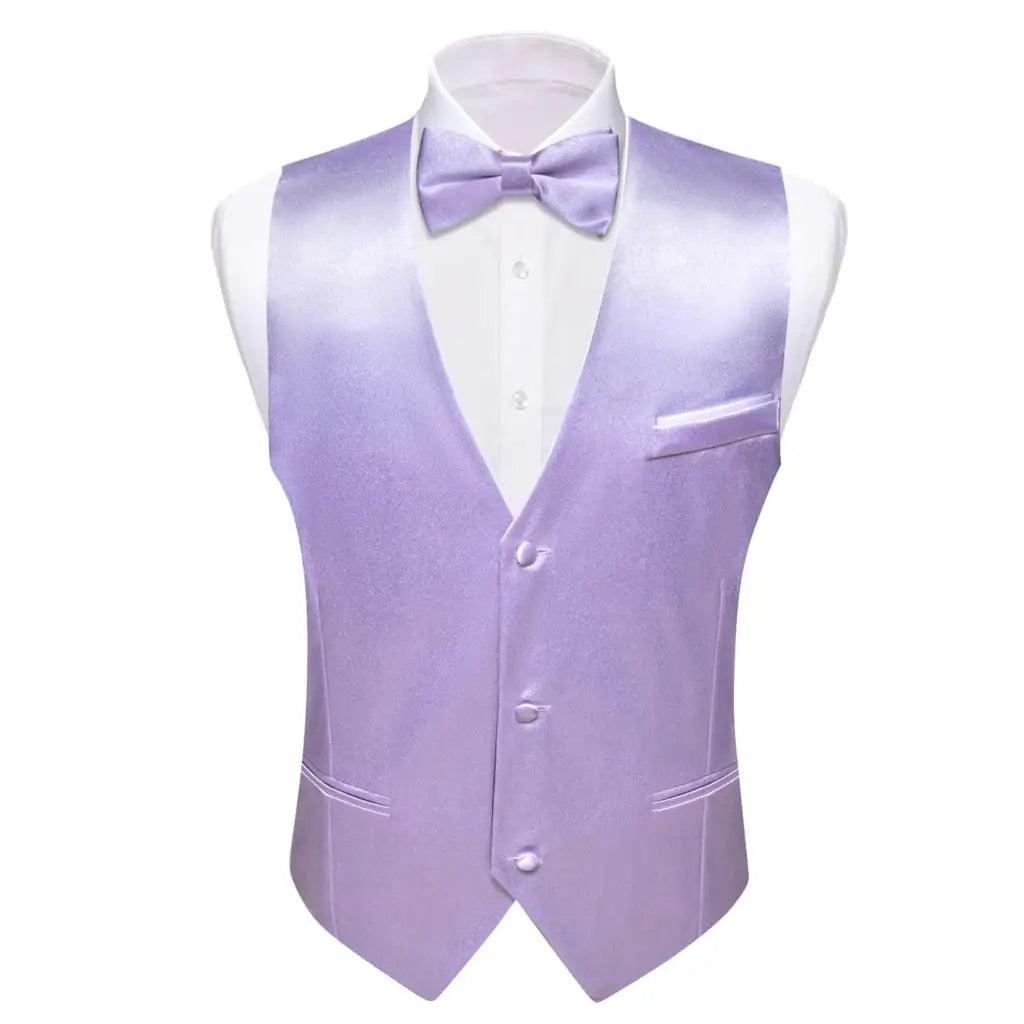 a purple vest with a white shirt and bow tie