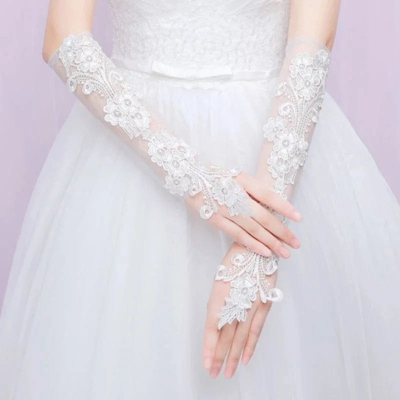 a close up of a person wearing a wedding glove