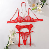 Red lace lingerie set with chain detail, perfect for romantic occasions, available in multiple sizes, lingerie NZ.