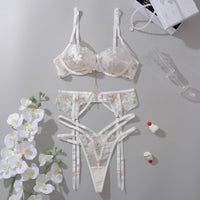 Floral lace bra and G-string set on display, showcasing elegant design for lingerie lovers in NZ.