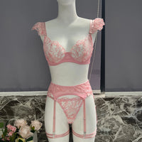 Pink lace bra and garter set for women with ruffle straps, perfect for confident, affordable lingerie in NZ.