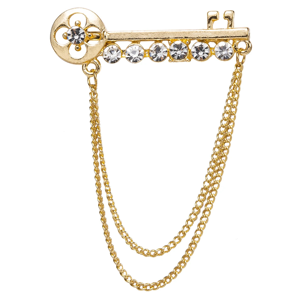 a gold brooch with a key and chain