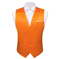 an orange vest with a white shirt on a mannequin