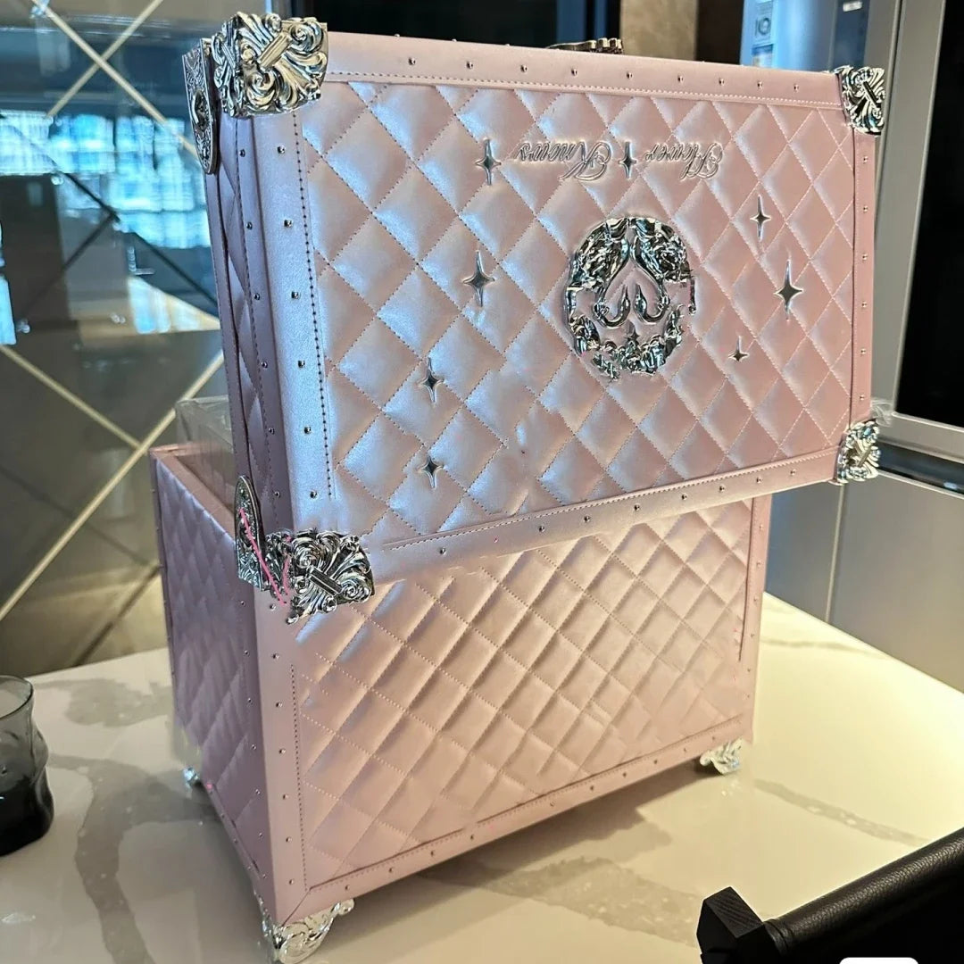 a pink box with a chanel logo on it