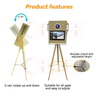 a wooden tripod stand with a picture on it