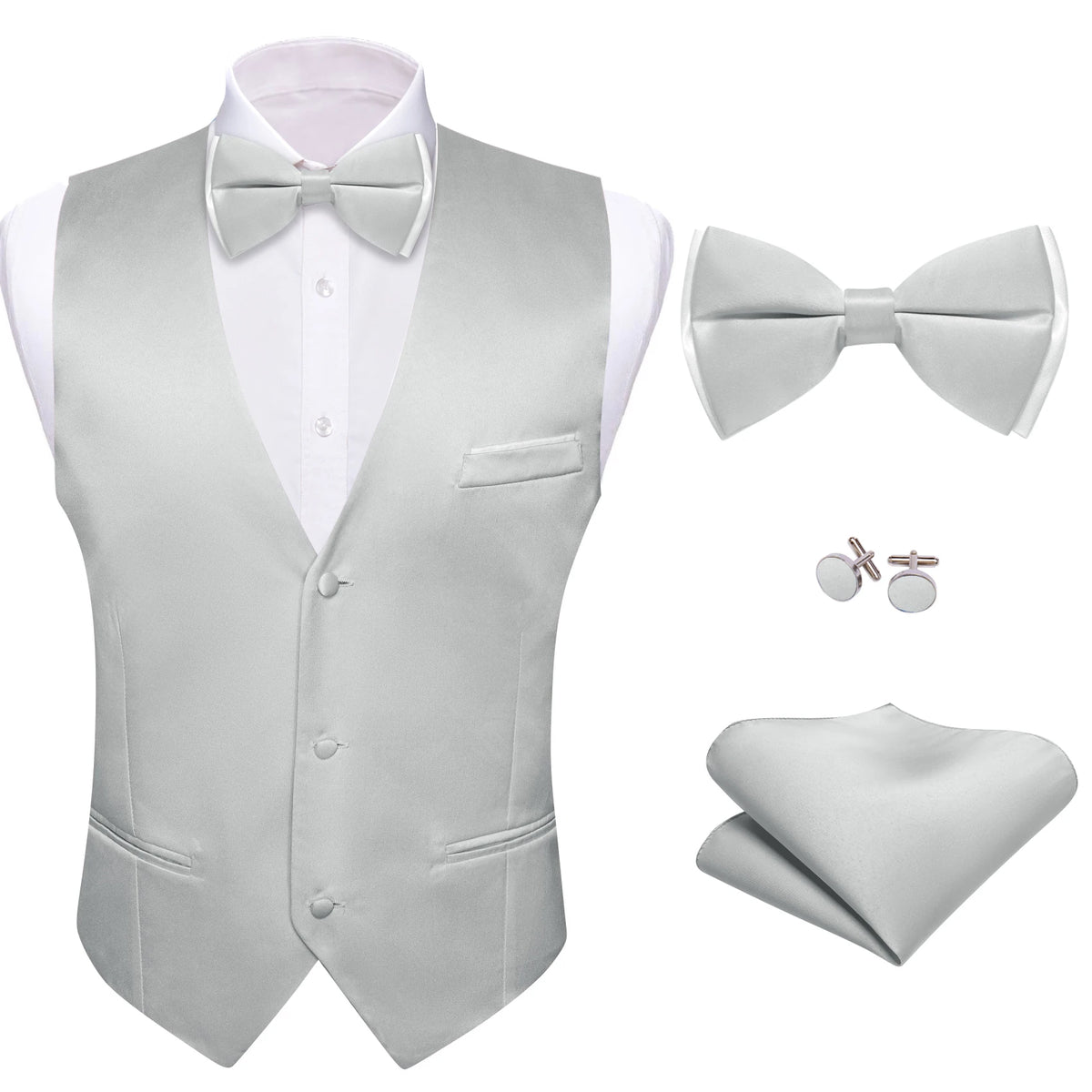 a white suit with a bow tie and cufflinks
