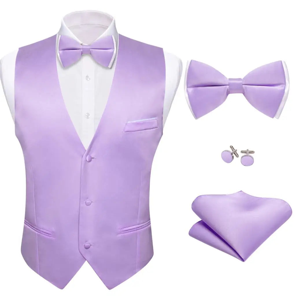 a purple suit and tie with a white shirt