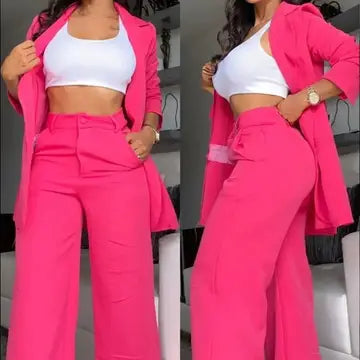 a woman in pink pants and a white top