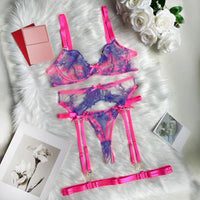 Floral lace garter belt set in pink and purple, featuring adjustable straps and exquisite detailing, perfect lingerie in NZ.