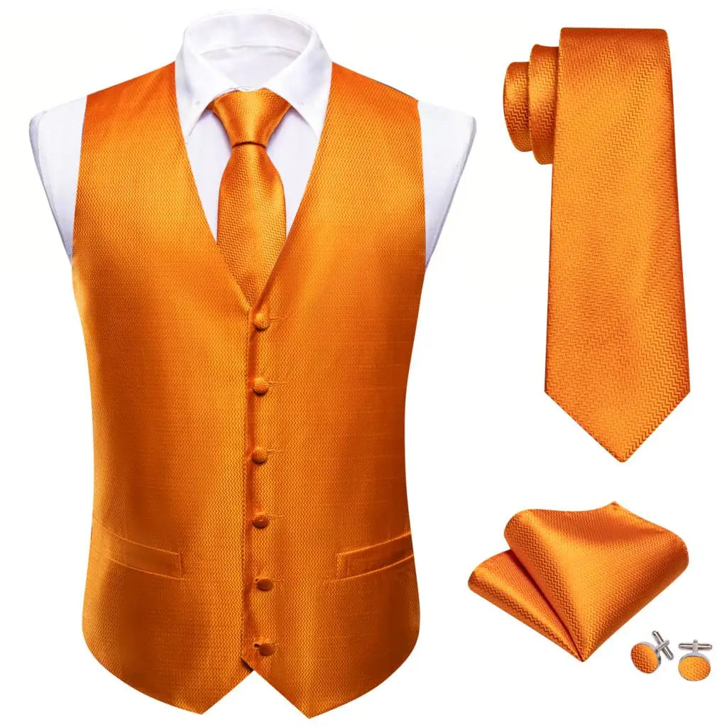 an orange vest, tie, and cufflinks on a mannequin