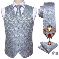 a man wearing a silver vest and tie