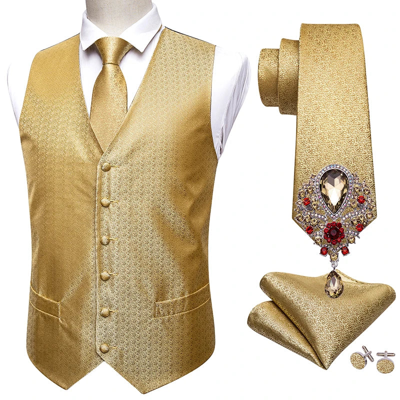 a gold vest, tie, and cufflinks are on display