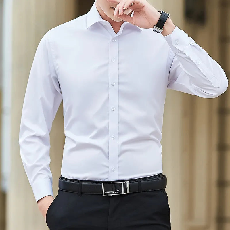 a man in a white shirt and black pants