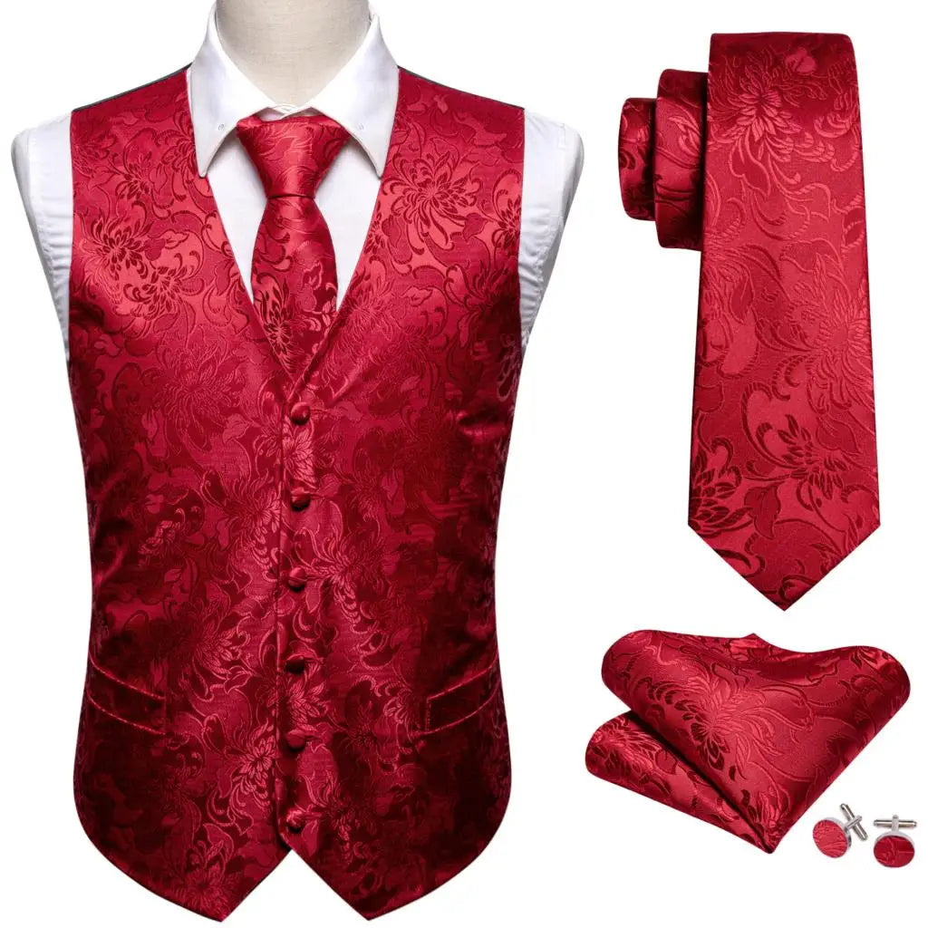 a red vest, tie, and matching cufflinks