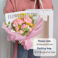 a woman is holding a bouquet of flowers