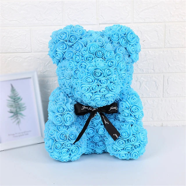 a blue teddy bear made out of roses