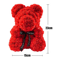 a red teddy bear made out of roses