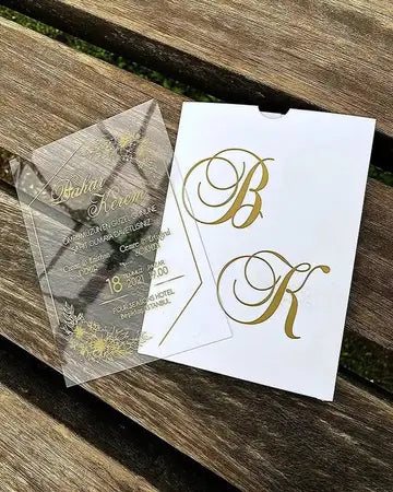 a close up of two cards on a wooden bench