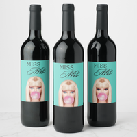 Bachelorette wine bottles with playful labels featuring 'Miss Mrs.' design and chic bubblegum illustration.