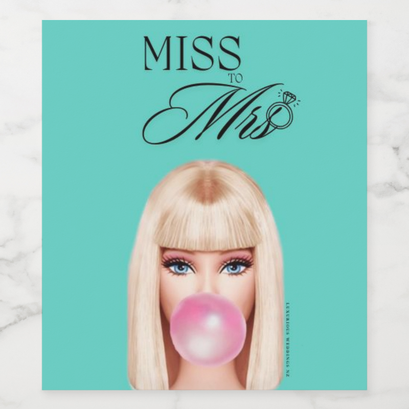 Bachelorette wine label design featuring a glamorous character blowing a bubble gum, with 'Miss to Mrs' title.