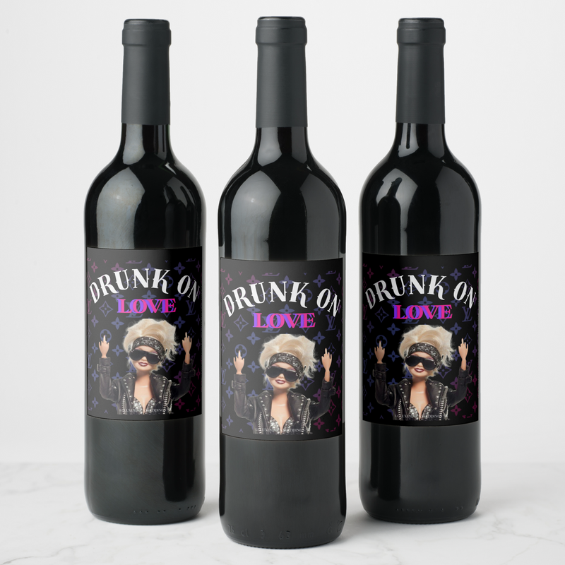 Three bachelorette wine bottles with 'Drunk on Love' labels featuring fun, stylish designs for celebrating.