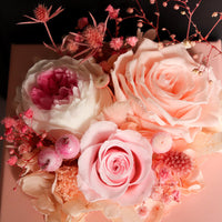 a close up of a bouquet of flowers on a table