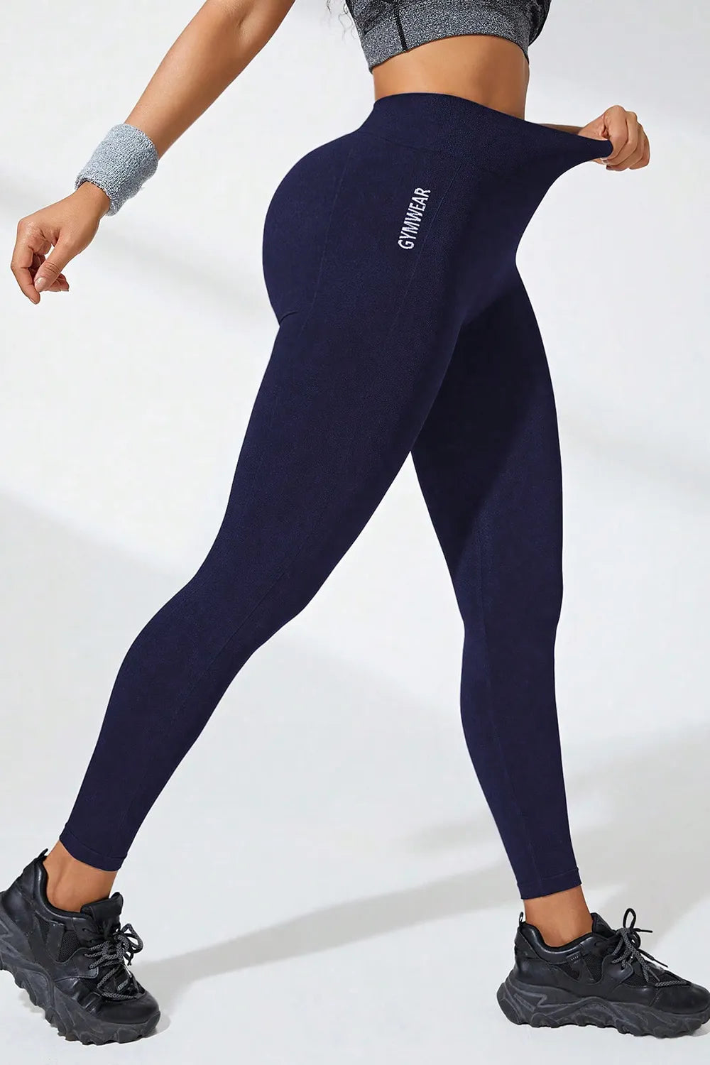 High waist active leggings in navy blue, featuring a basic style and highly stretchy fabric for comfort and flexibility.