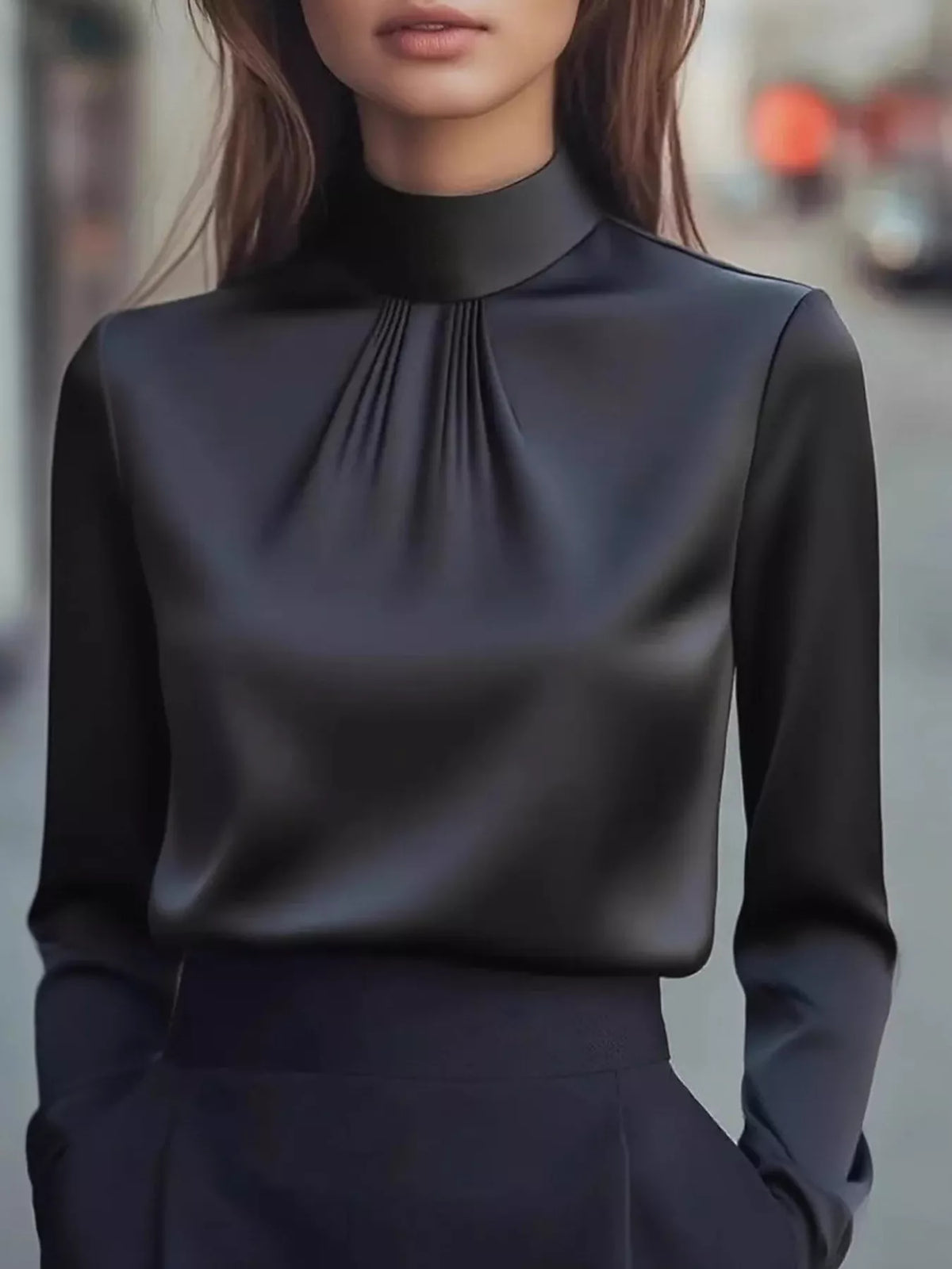 Mock Neck Long Sleeve Blouse with Pleated Detail in sleek black, showcasing stylish pleated design and contemporary silhouette.