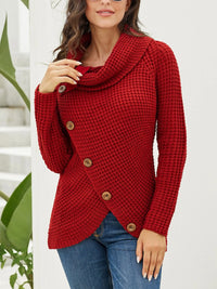 Full size red textured turtleneck long sleeve sweater featuring decorative buttons and a stylish wrap design.
