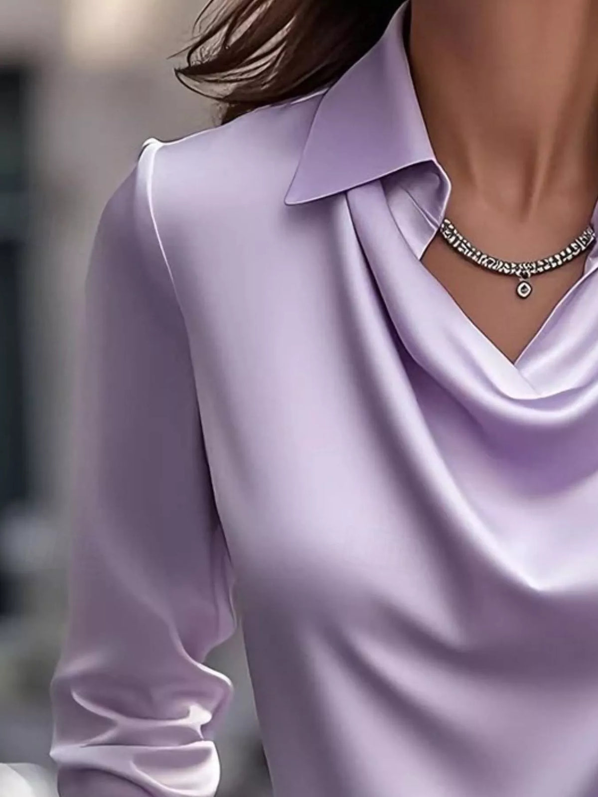 Ruched Long Sleeve Drape Collar Blouse in light purple with a stylish cowl neck and a delicate necklace.