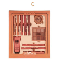 an orange box containing a variety of beauty products