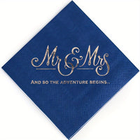 a blue and gold wedding napkin with the words mr and mrs on it