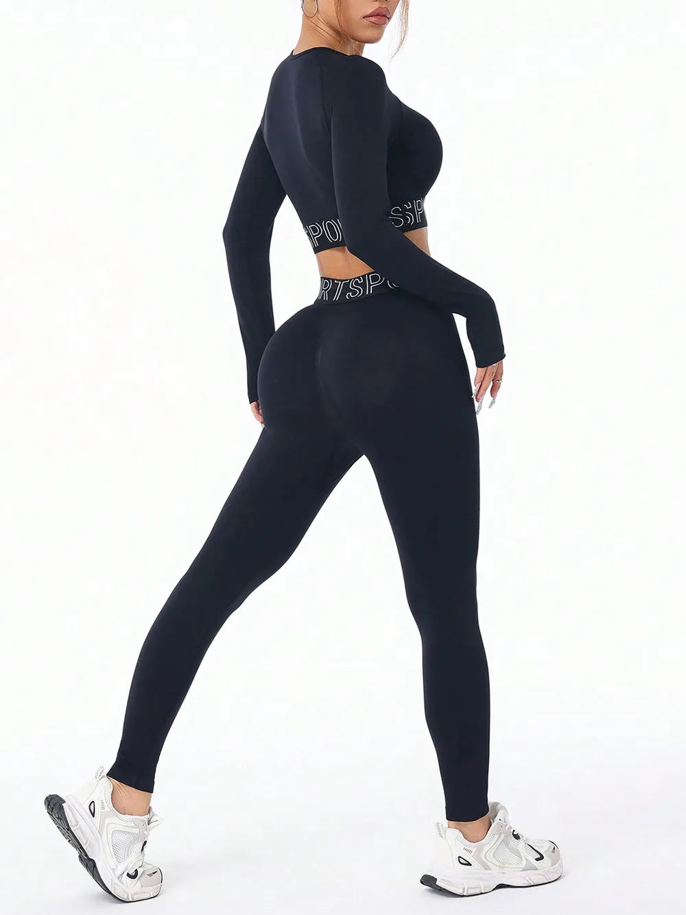 Model wearing a black letter print round neck long sleeve top and leggings active set, showcasing affordable activewear style.