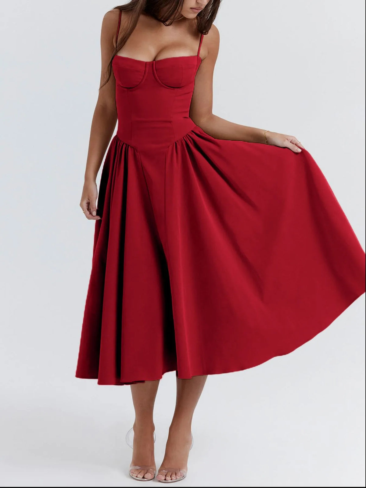 Ruched sweetheart neck cami dress in red, featuring a flowing skirt and adjustable straps perfect for casual or formal occasions.