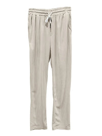 Beige drawstring pants with pockets, perfect for casual wear and relaxation.
