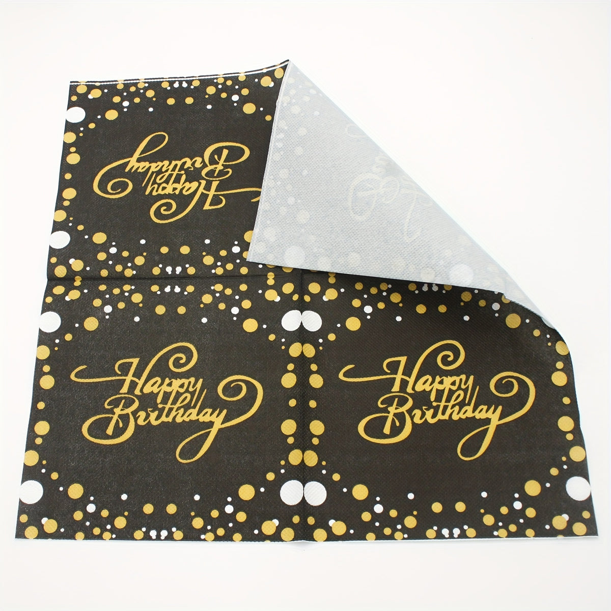 a black and gold birthday napkin with happy birthday written on it