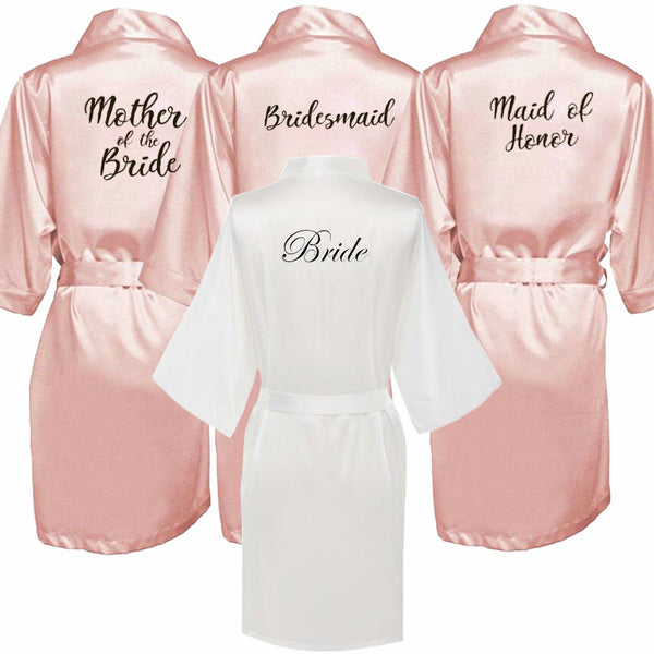 three bridesmaid robes with the bride's name on them