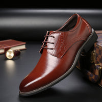 Stylish brown lace-up leather shoes for men, perfect for luxurious weddings and formal occasions.