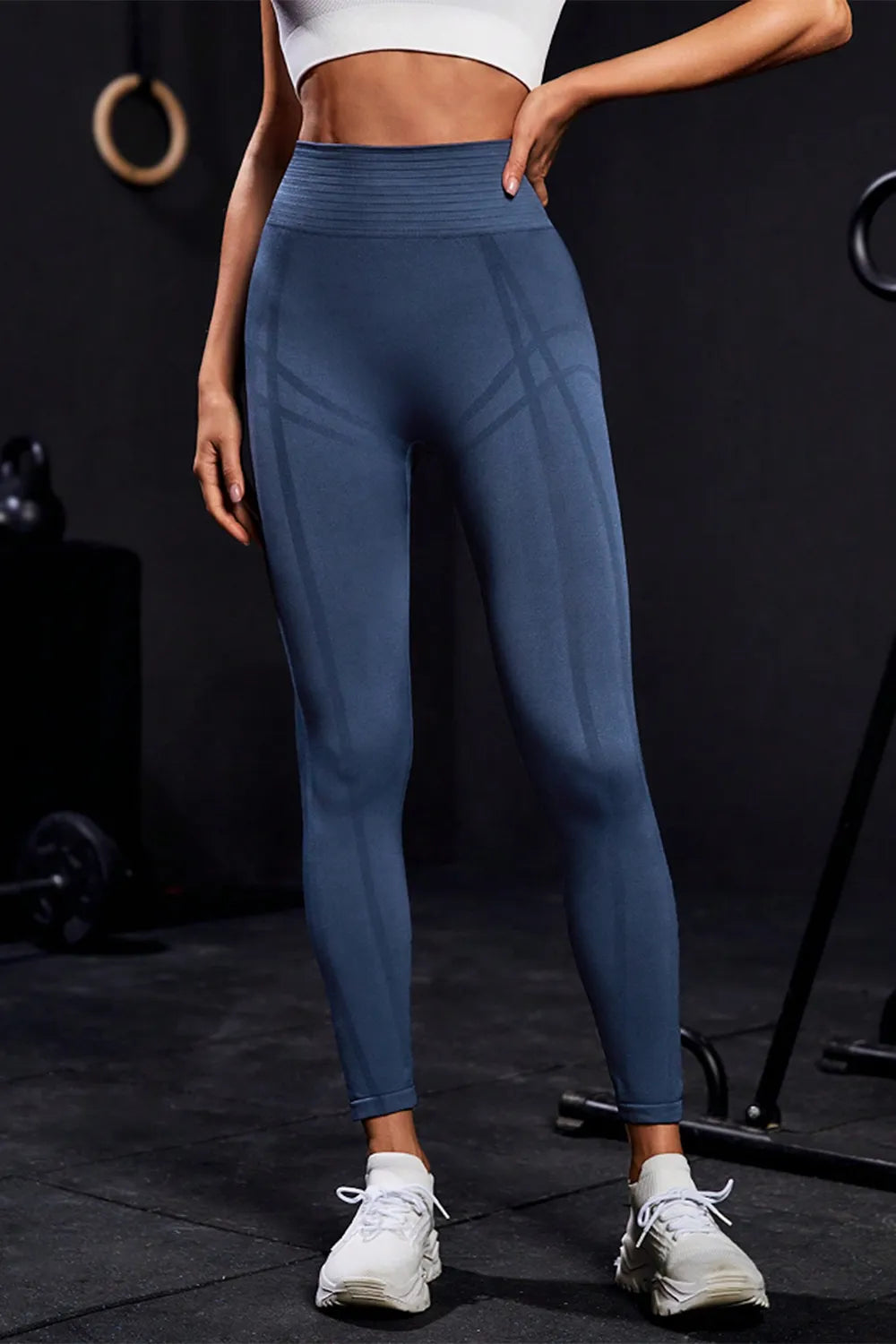 Wide waistband high waist active leggings in dark blue, perfect for workouts and casual wear, highlighting comfort and style.