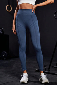 Wide waistband high waist active leggings in dark blue, perfect for workouts and casual wear, highlighting comfort and style.