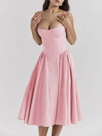 Ruched sweetheart neck cami dress in pink, featuring a fitted bodice and flared skirt, perfect for casual outings.