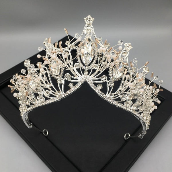 a tiara is shown on a black tray
