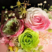 a close up of a bouquet of flowers on a table