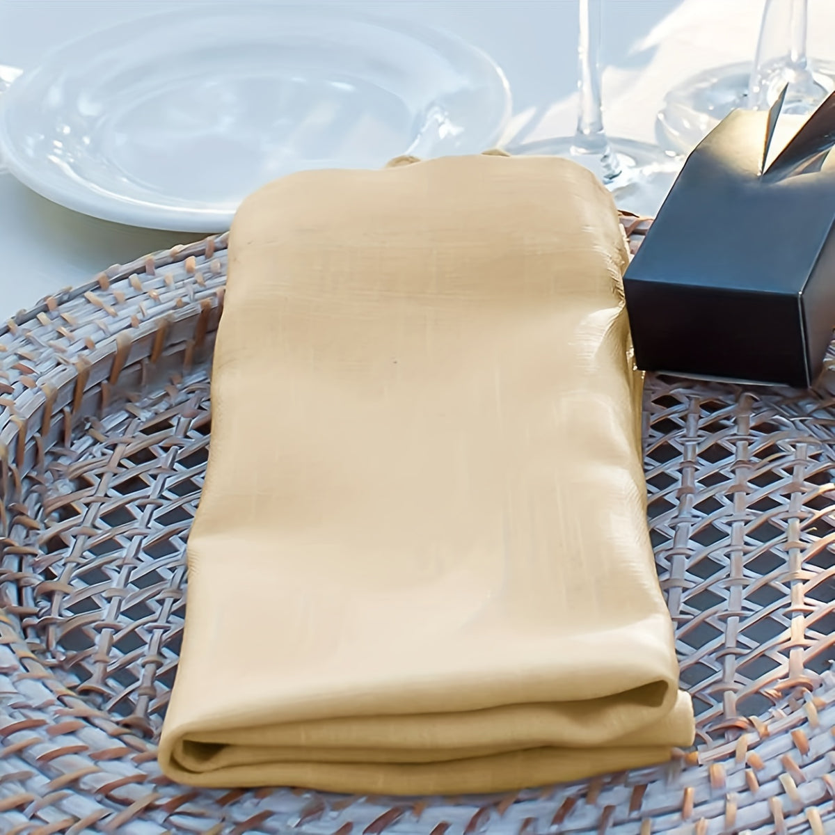 a table setting with a napkin and a knife