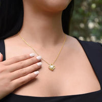 a close up of a woman wearing a necklace