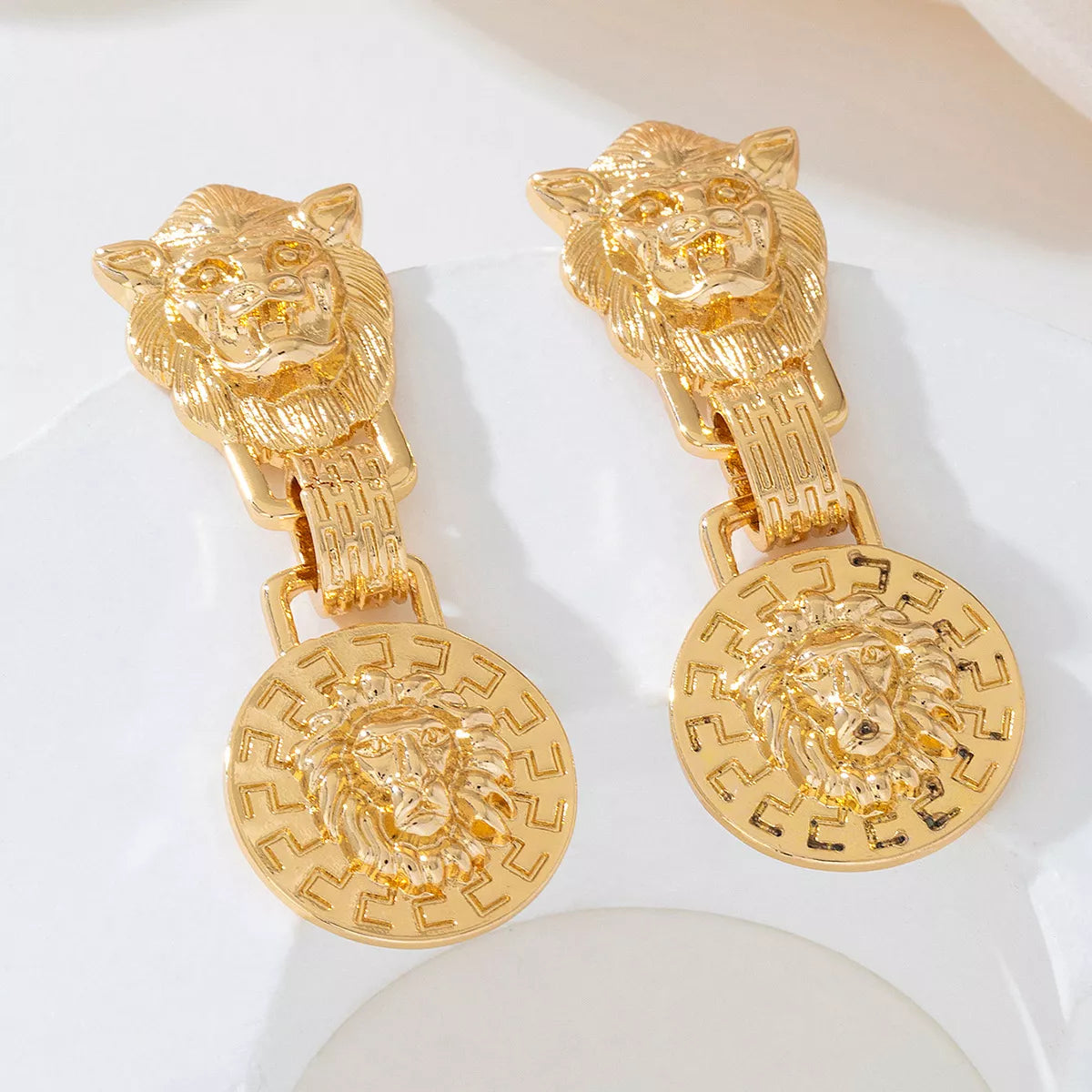 18K Gold-Plated Lion Head Medallion Drop Earrings with intricate lion motifs and luxurious gold finish.