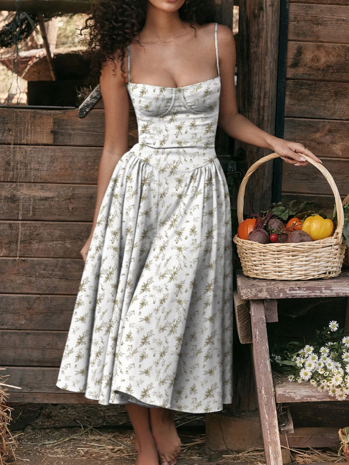 Ruched sweetheart neck cami dress in floral pattern, perfect for summer outings, paired with a basket of fresh vegetables.
