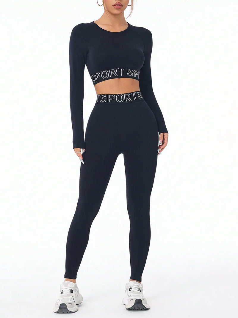 Black letter print round neck long sleeve top and leggings active set for affordable activewear.
